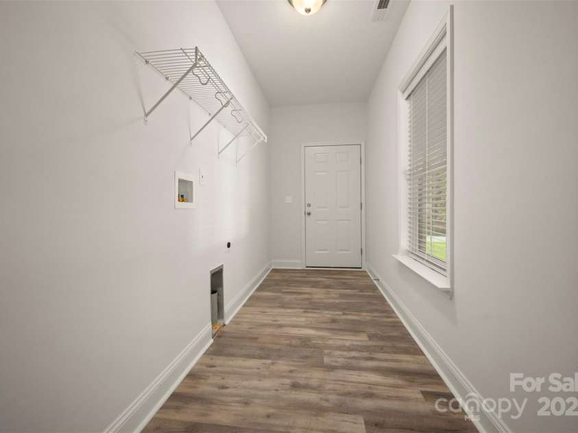 321 Benjamins Way, Hendersonville, NC 28792.  MLS# CAR4276870, YatesRealty ID 303. Laundry/mud room with entry from the garage