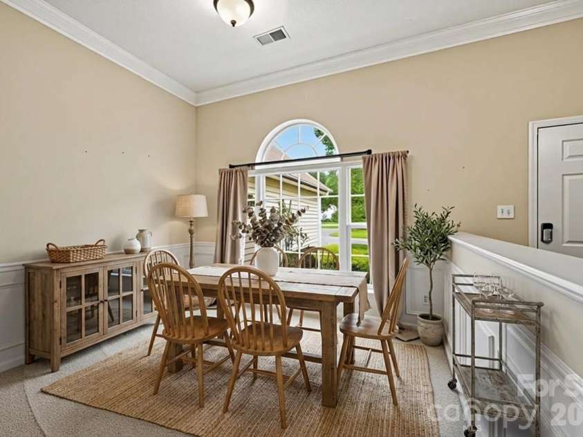 9421 Foggy Meadow Road, Charlotte, NC 28269.  MLS# CAR4391602, YatesRealty ID 30303. Dining area virtually staged