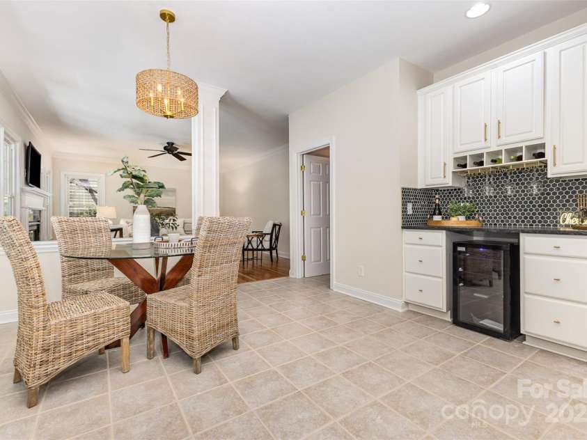 2919 Shady Reach Lane, Charlotte, NC 28214.  MLS# CAR4272489, YatesRealty ID 30305. Dry bar with new fridge & leathered granite countertop