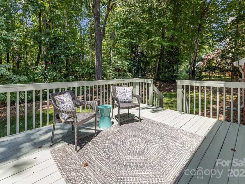 2919 Shady Reach Lane, Charlotte, NC 28214.  MLS# CAR4272489, YatesRealty ID 30305. Freshly stained deck off kitchen