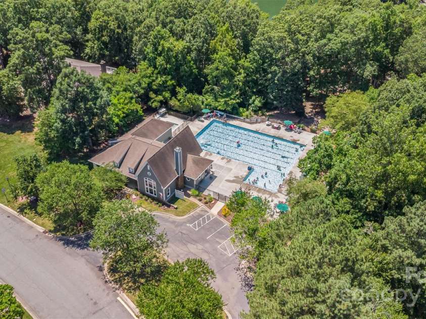2919 Shady Reach Lane, Charlotte, NC 28214.  MLS# CAR4272489, YatesRealty ID 30305. Lakefront pool, clubhouse, picnic area and playground