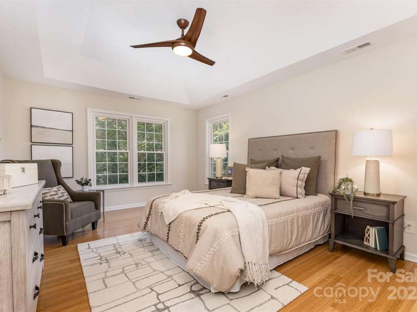 2919 Shady Reach Lane, Charlotte, NC 28214.  MLS# CAR4272489, YatesRealty ID 30305. Luxurious primary suite with hardwoods