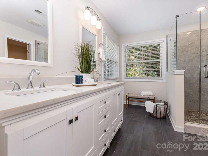 2919 Shady Reach Lane, Charlotte, NC 28214.  MLS# CAR4272489, YatesRealty ID 30305. Modern cabinetry, tile and lighting