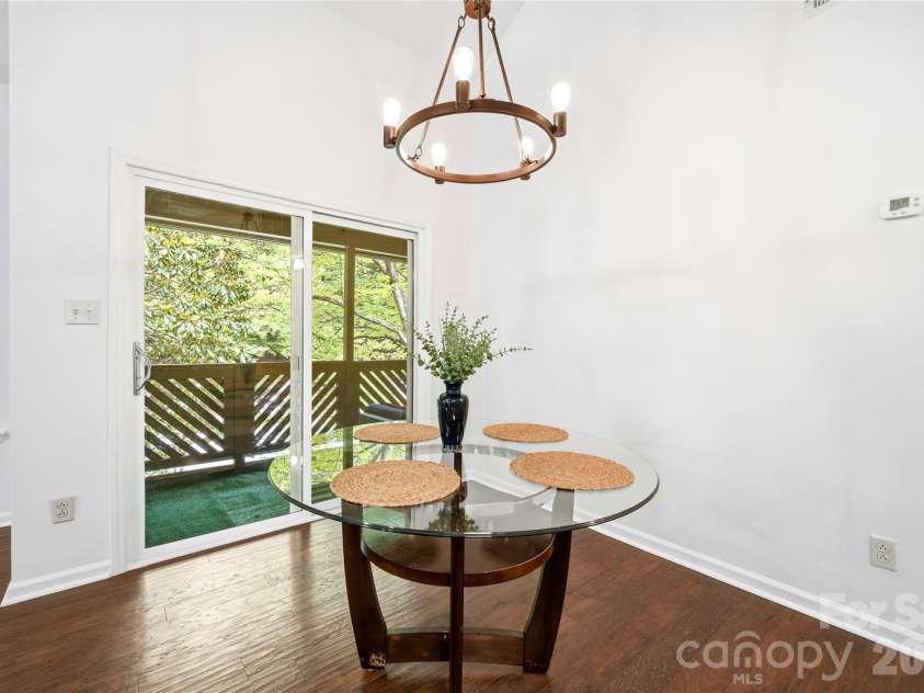 6150 Gray Gate Lane, Charlotte, NC 28210.  MLS# CAR4392595, YatesRealty ID 30307. Dining area with covered deck