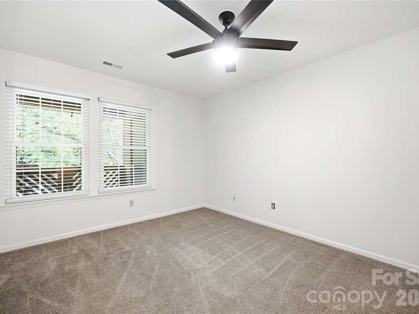 6150 Gray Gate Lane, Charlotte, NC 28210.  MLS# CAR4392595, YatesRealty ID 30307. Primary BR Interior view overlooking Deck