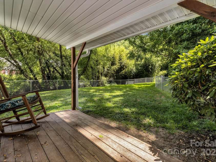 48 Allen Drive, Waynesville, NC 28786.  MLS# CAR4278077, YatesRealty ID 30310. Covered deck