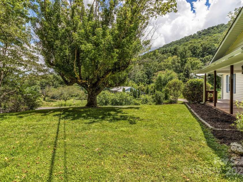 48 Allen Drive, Waynesville, NC 28786.  MLS# CAR4278077, YatesRealty ID 30310. Unusual flat yard!