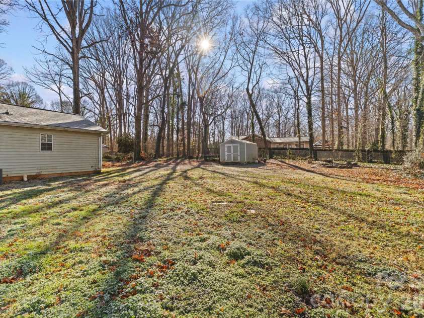 117 Robinson Avenue, Matthews, NC 28104.  MLS# CAR4388191, YatesRealty ID 30314. Backyard