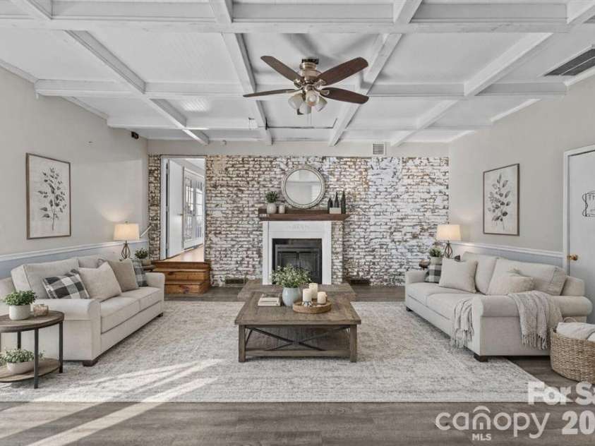 117 Robinson Avenue, Matthews, NC 28104.  MLS# CAR4388191, YatesRealty ID 30314. Virtually Staged Living Room