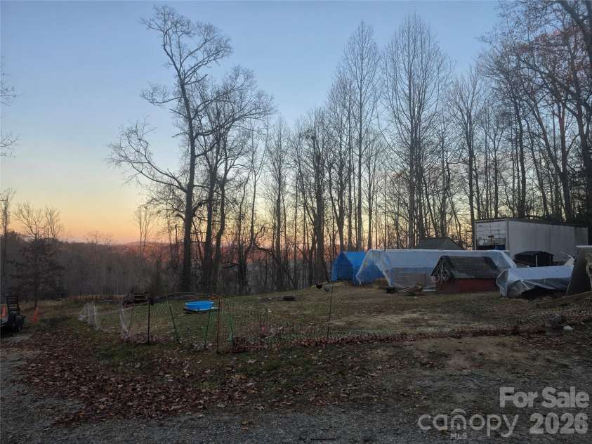 1480 Davis Mountain Road, Hendersonville, NC 28739.  MLS# CAR4390501, YatesRealty ID 30320. Winter sunsets from Parcel 1