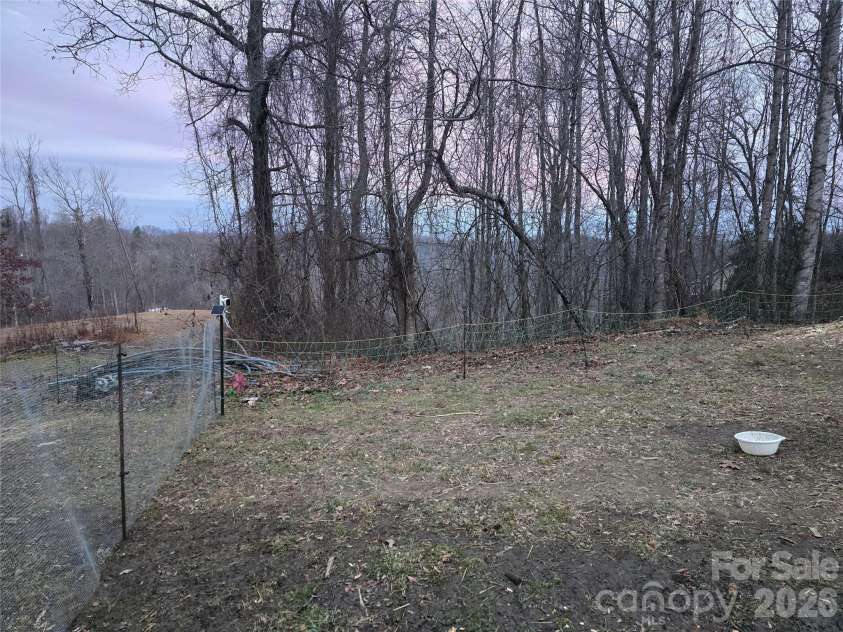 1480 Davis Mountain Road, Hendersonville, NC 28739.  MLS# CAR4390501, YatesRealty ID 30320. Winter view 