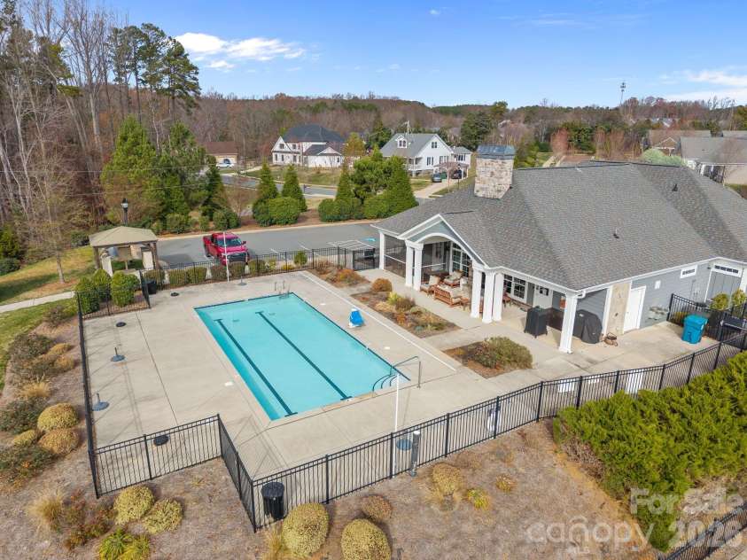 15012 Courtside Cove Lane, Cornelius, NC 28031.  MLS# CAR4326155, YatesRealty ID 30321. Community pool and clubhouse