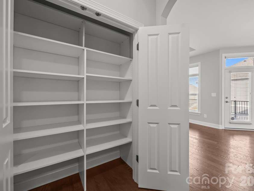 15012 Courtside Cove Lane, Cornelius, NC 28031.  MLS# CAR4326155, YatesRealty ID 30321. Custom closet / pantry