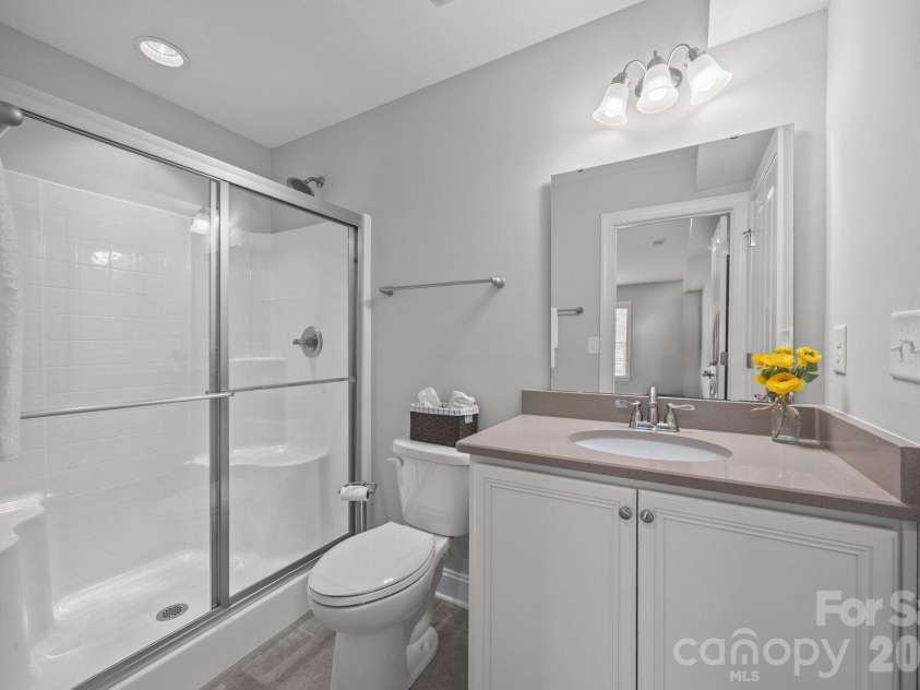 15012 Courtside Cove Lane, Cornelius, NC 28031.  MLS# CAR4326155, YatesRealty ID 30321. Full bathroom in basement