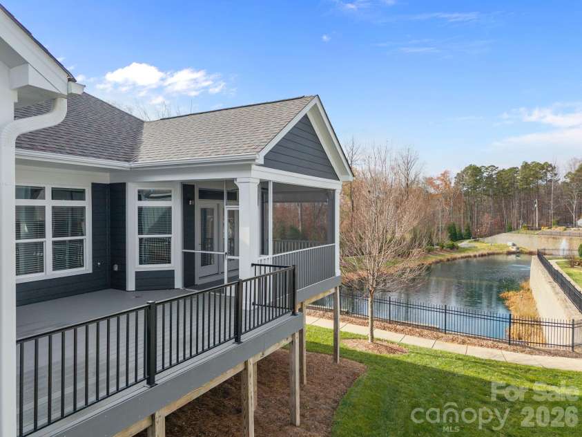 15012 Courtside Cove Lane, Cornelius, NC 28031.  MLS# CAR4326155, YatesRealty ID 30321. Large deck and part of it screened in