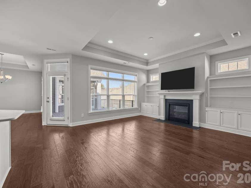 15012 Courtside Cove Lane, Cornelius, NC 28031.  MLS# CAR4326155, YatesRealty ID 30321. Living room