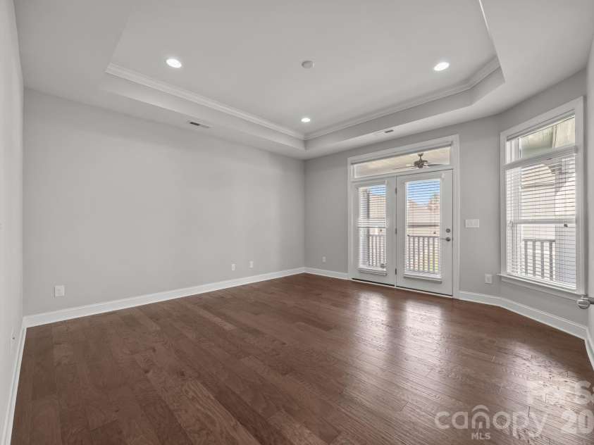 15012 Courtside Cove Lane, Cornelius, NC 28031.  MLS# CAR4326155, YatesRealty ID 30321. Primary bedroom