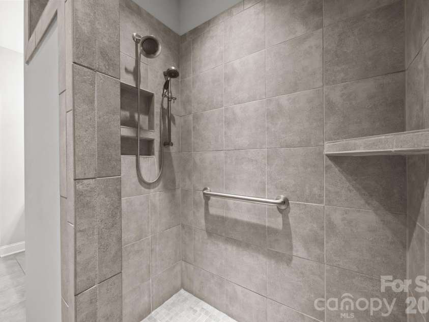 15012 Courtside Cove Lane, Cornelius, NC 28031.  MLS# CAR4326155, YatesRealty ID 30321. Primary walk-in shower