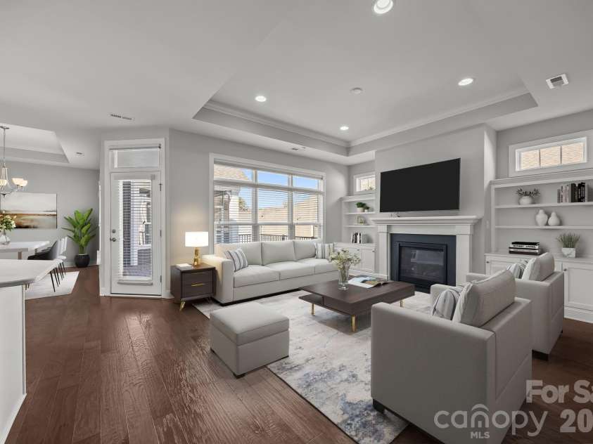 15012 Courtside Cove Lane, Cornelius, NC 28031.  MLS# CAR4326155, YatesRealty ID 30321. Virtually staged living room