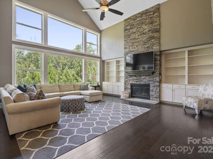 426 Kirkbride Court, Fort Mill, SC 29715.  MLS# CAR4270139, YatesRealty ID 30322. 2 story Great Room w/Stone gas fireplace & built-in bookcases