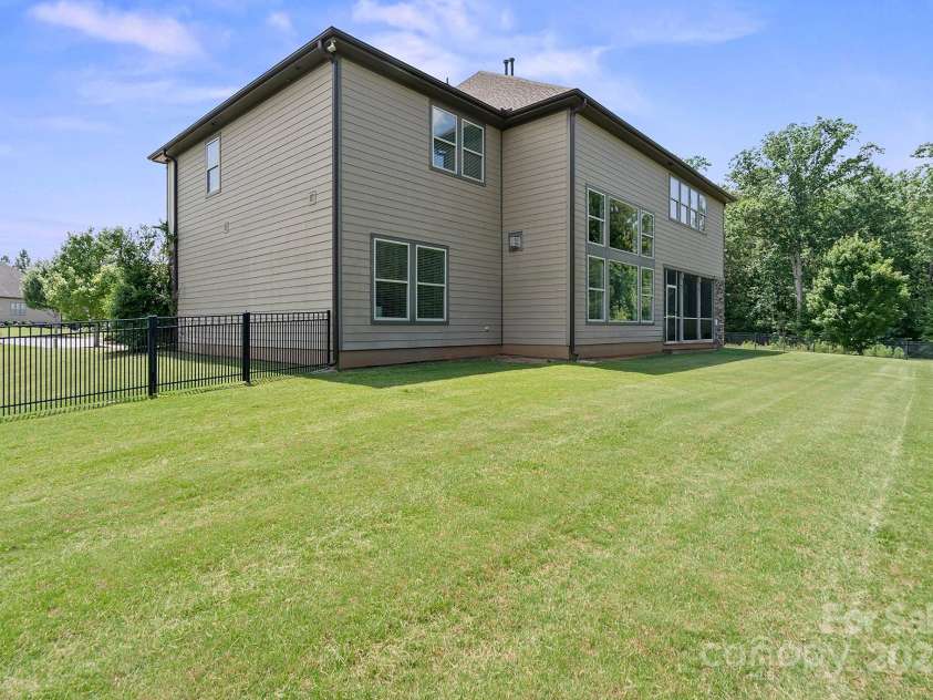 426 Kirkbride Court, Fort Mill, SC 29715.  MLS# CAR4270139, YatesRealty ID 30322. Fenced back yard has lots of room for the kids