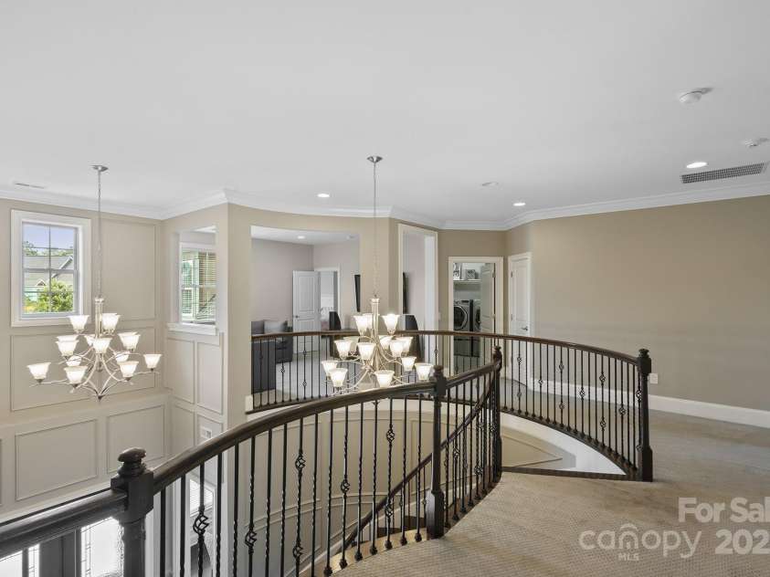426 Kirkbride Court, Fort Mill, SC 29715.  MLS# CAR4270139, YatesRealty ID 30322. Upstairs foyer w/Juliet balcony