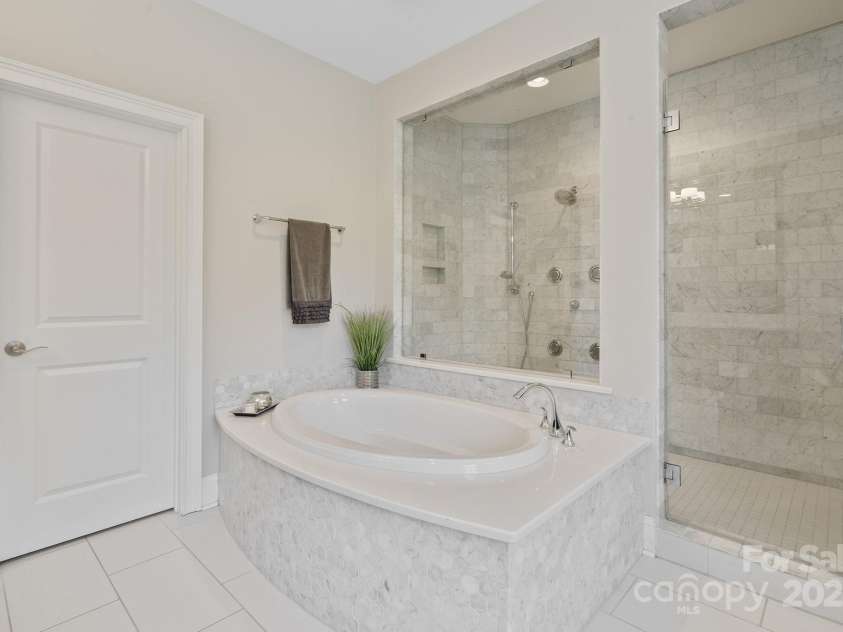 426 Kirkbride Court, Fort Mill, SC 29715.  MLS# CAR4270139, YatesRealty ID 30322. Walk-in shower has rainfall head and jets