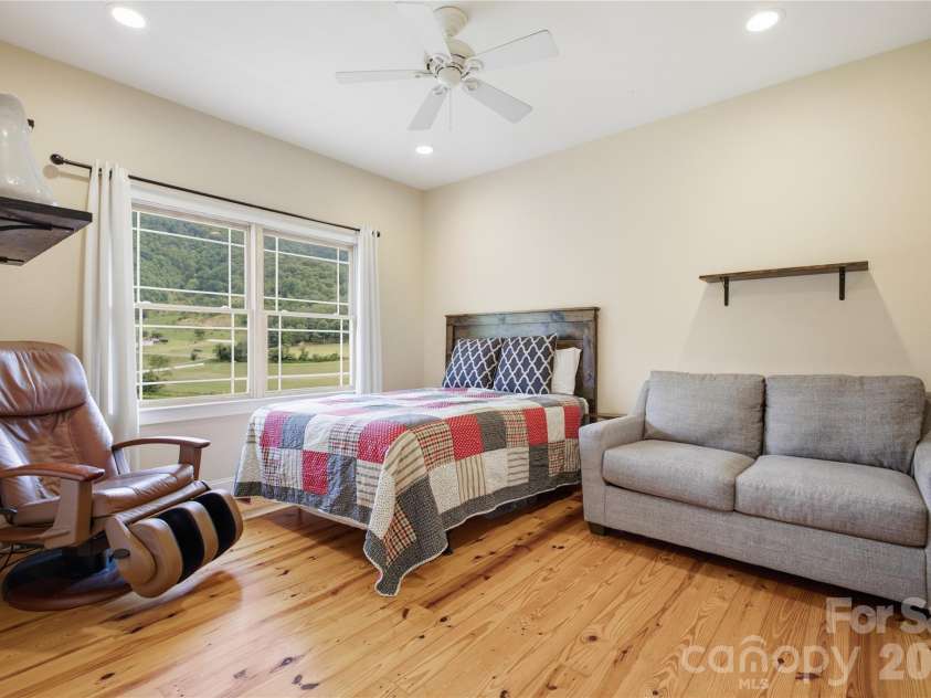 227 Black Bear Cove, Clyde, NC 28721.  MLS# CAR4393191, YatesRealty ID 30326. Bedroom 2 Upper Floor