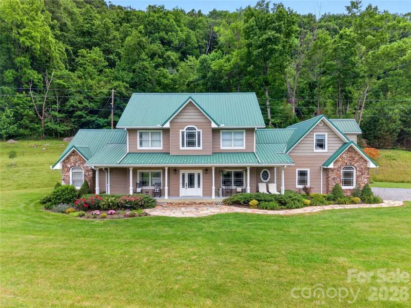 227 Black Bear Cove, Clyde, NC 28721.  MLS# CAR4393191, YatesRealty ID 30326. Front of House