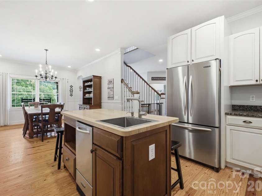227 Black Bear Cove, Clyde, NC 28721.  MLS# CAR4393191, YatesRealty ID 30326. Kitchen looking into dining area