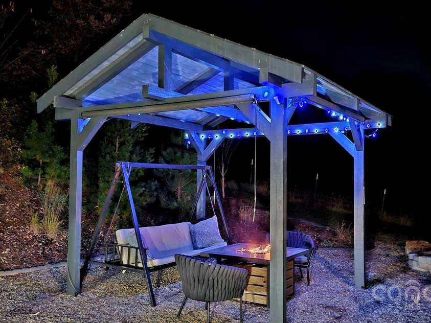 24 Mink Farm Road, Leicester, NC 28748.  MLS# CAR4278001, YatesRealty ID 30326. Pergola at Night