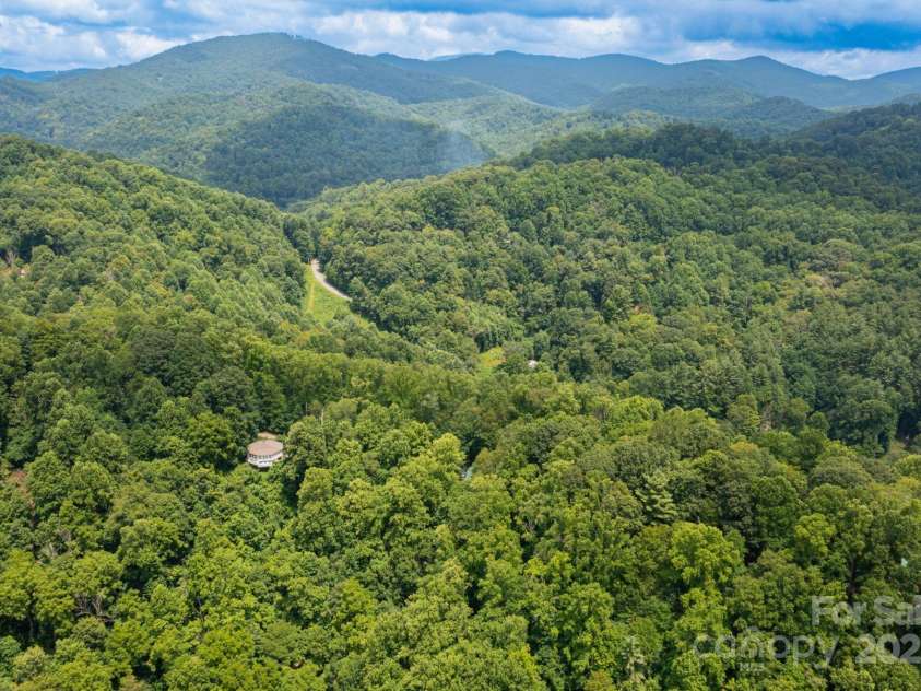 192 Granny Shepherd Road, Mars Hill, NC 28754.  MLS# CAR4285512, YatesRealty ID 3033. If you zoom in, you can see the house thru the trees in the center of the picture.