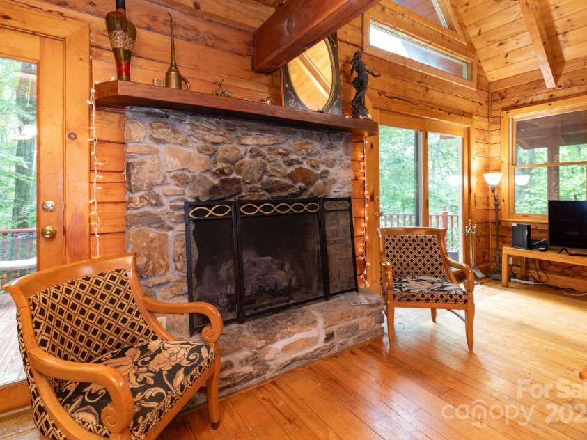 192 Granny Shepherd Road, Mars Hill, NC 28754.  MLS# CAR4285512, YatesRealty ID 3033. Stone fireplace.