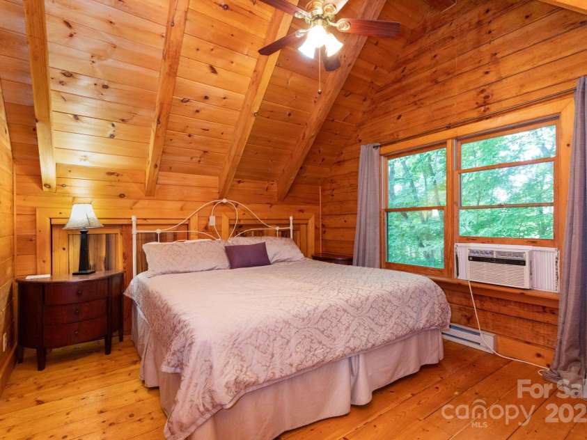 192 Granny Shepherd Road, Mars Hill, NC 28754.  MLS# CAR4285512, YatesRealty ID 3033. Upper level bedroom with closet and even more built in storage,