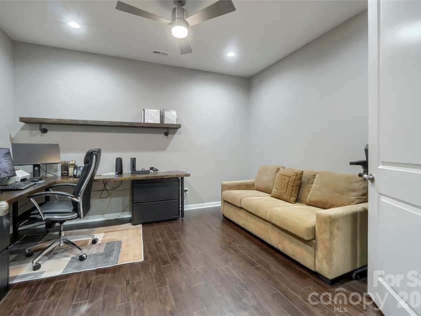 5925 Gatekeeper Lane, Mint Hill, NC 28227.  MLS# CAR4388583, YatesRealty ID 30338. Flex space is currently an office with sleeper sofa for unexpected guests