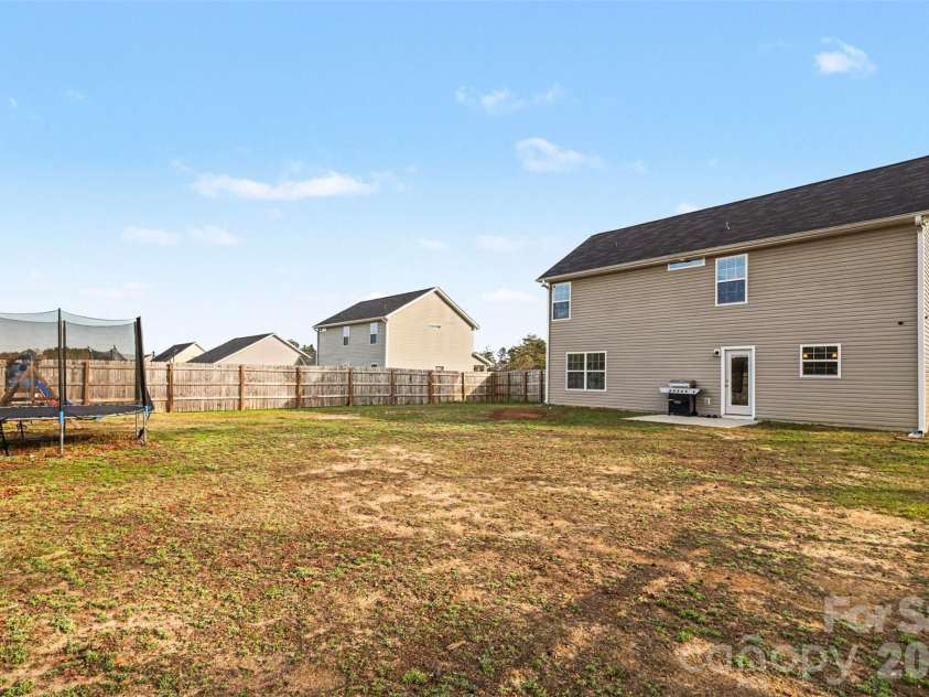 941 Airport Road, Pageland, SC 29728.  MLS# CAR4355541, YatesRealty ID 30340. Large fenced in back yard