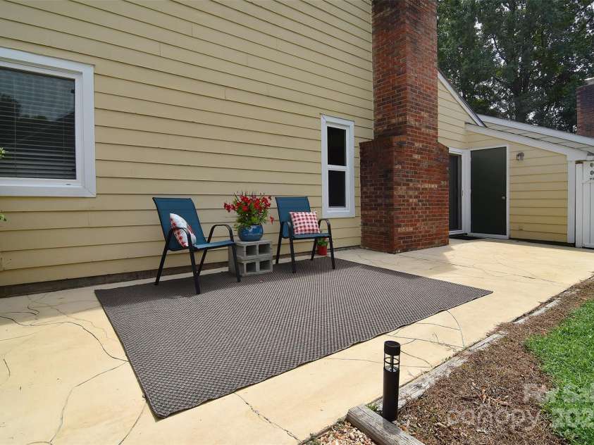 9034 Mcalpine Cove Court, Charlotte, NC 28270.  MLS# CAR4289074, YatesRealty ID 30347. Rear patio