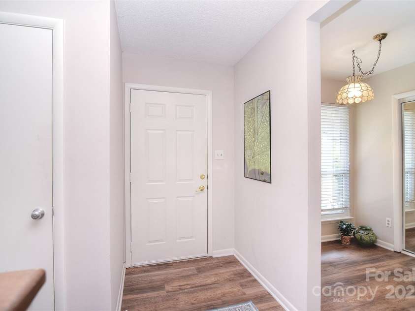9034 Mcalpine Cove Court, Charlotte, NC 28270.  MLS# CAR4289074, YatesRealty ID 30347. View of front entry