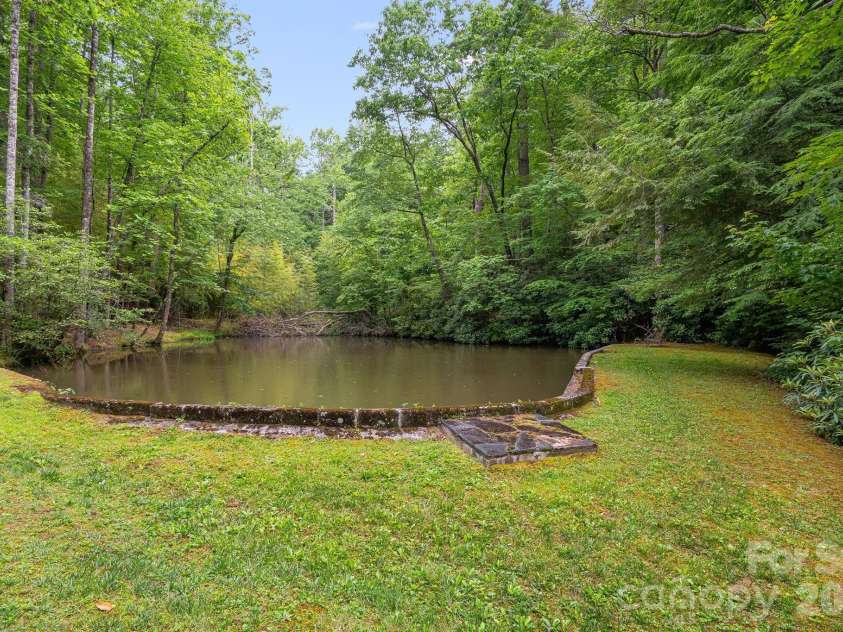 295 Roberts Lane, Flat Rock, NC 28731.  MLS# CAR4384600, YatesRealty ID 30348. Community Pond