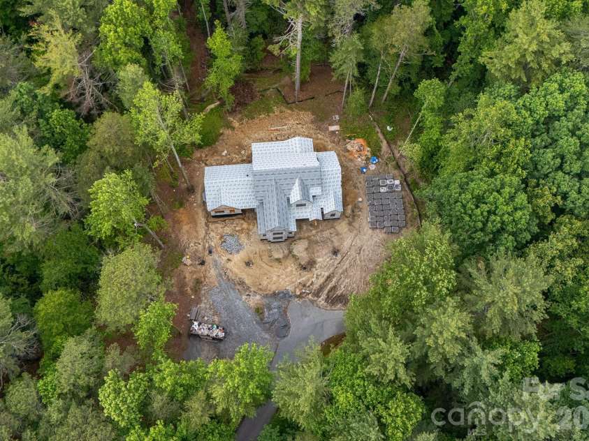 295 Roberts Lane, Flat Rock, NC 28731.  MLS# CAR4384600, YatesRealty ID 30348. Overview of home tucked in pure privacy at the end of the cul de sac