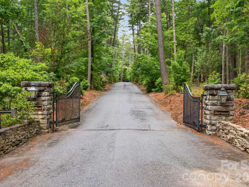295 Roberts Lane, Flat Rock, NC 28731.  MLS# CAR4384600, YatesRealty ID 30348. Sherwood Estates Entrance