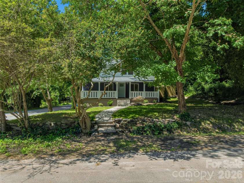 895 Trade Street, Tryon, NC 28782.  MLS# CAR4390886, YatesRealty ID 30349. 