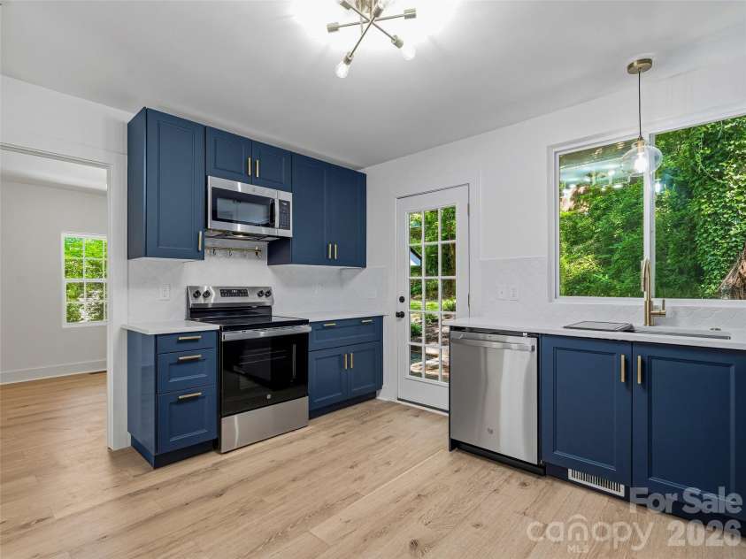 895 Trade Street, Tryon, NC 28782.  MLS# CAR4390886, YatesRealty ID 30349. 