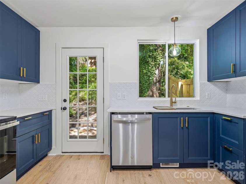 895 Trade Street, Tryon, NC 28782.  MLS# CAR4390886, YatesRealty ID 30349. 