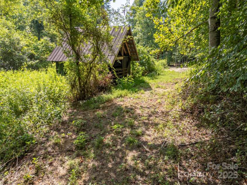 1084 Old Howard Gap Road, Saluda, NC 28773.  MLS# CAR4162081, YatesRealty ID 3035. 