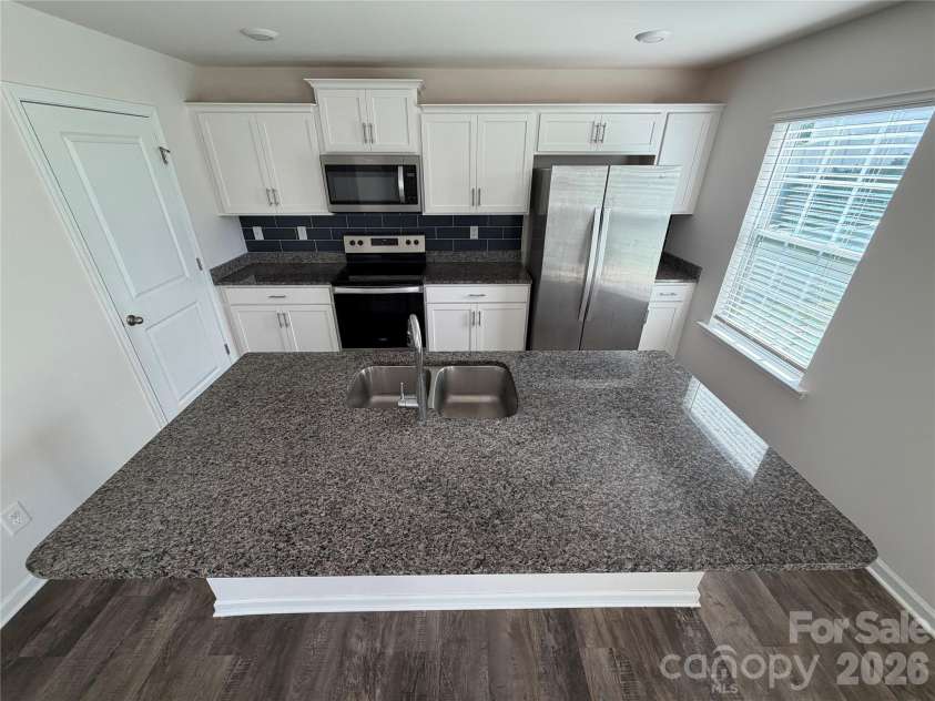 7868 Whispering Stream Drive, Sherrills Ford, NC 28673.  MLS# CAR4380726, YatesRealty ID 30352. Nice huge kitchen island