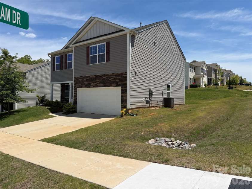 7868 Whispering Stream Drive, Sherrills Ford, NC 28673.  MLS# CAR4380726, YatesRealty ID 30352. Nice side yard and backyard