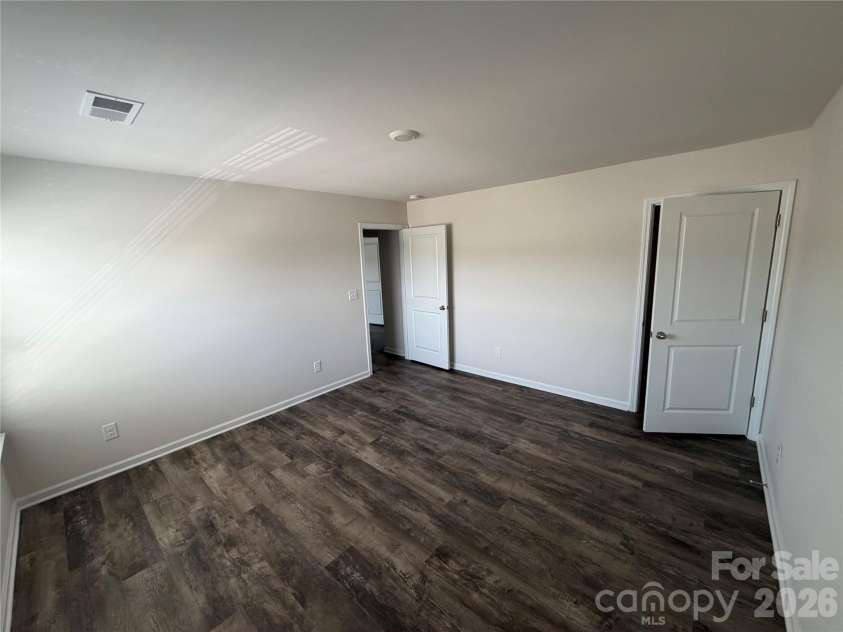 7868 Whispering Stream Drive, Sherrills Ford, NC 28673.  MLS# CAR4380726, YatesRealty ID 30352. Second bedroom facing front yard