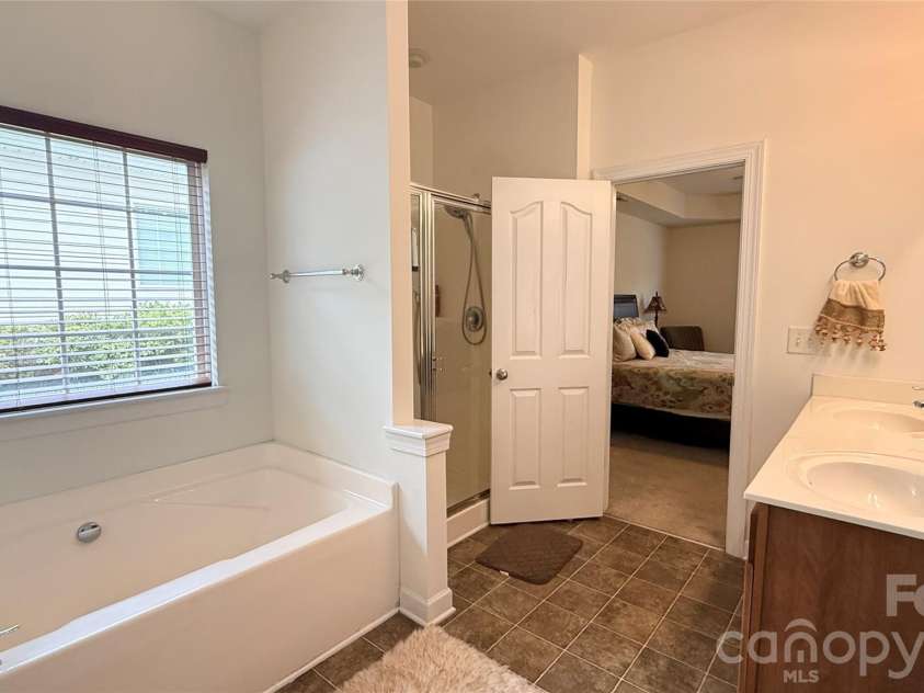 2623 Sierra Chase Drive, Monroe, NC 28112.  MLS# CAR4382896, YatesRealty ID 30353. Primary Bathroom