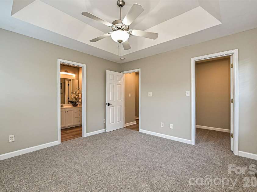 3805 Cassidy Drive, Waxhaw, NC 28173.  MLS# CAR4392731, YatesRealty ID 30357. The primary bedroom has a tray ceiling and two closets!